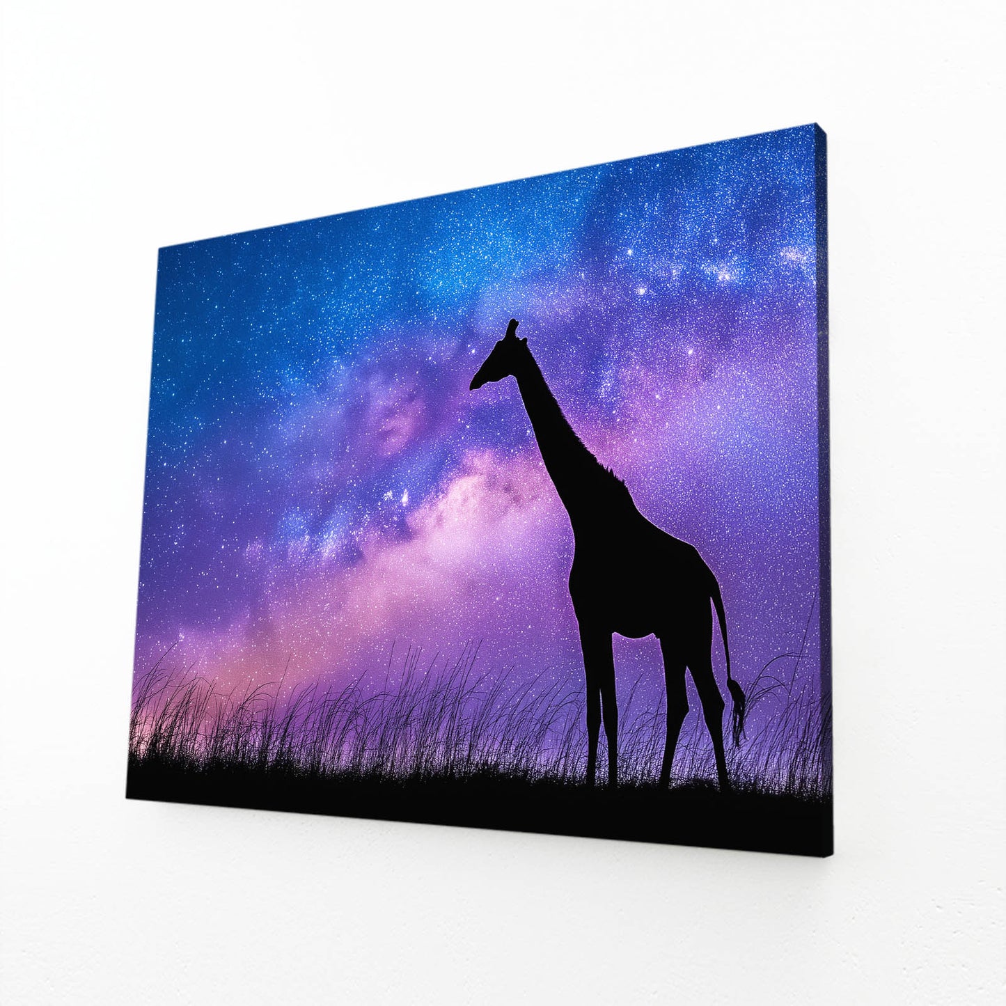 Giraffe silhouette against a starry sky with purple and blue hues
