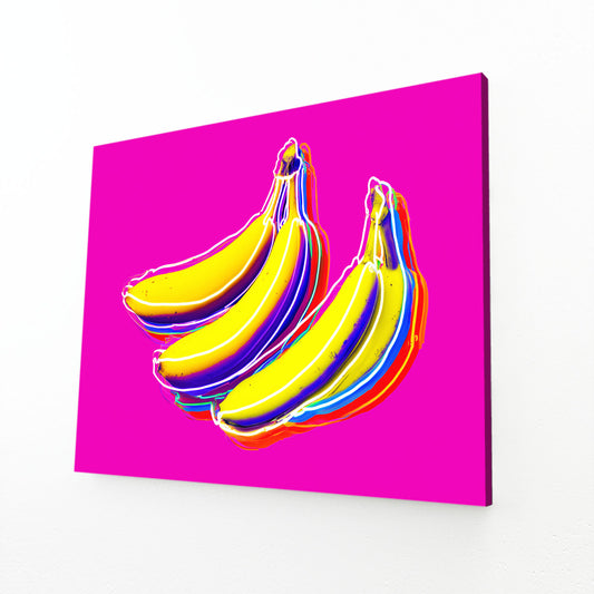 Pop Banana Magenta Fruit Wall Decor – angled canvas view on white background