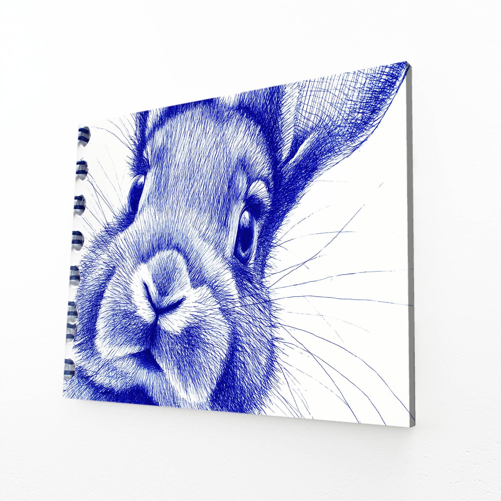 Blue Rabbit Art – angled canvas view on white background