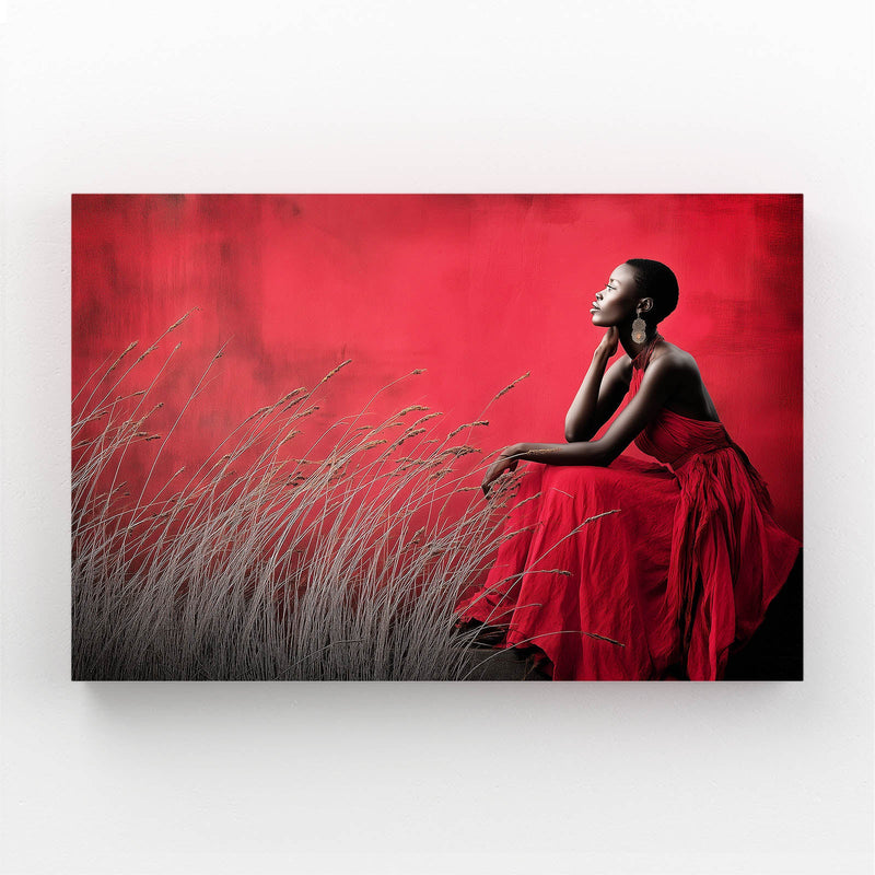 Crimson Meadow Red Photography Wall Art – woman in red gown seated in silver grass on crimson field
