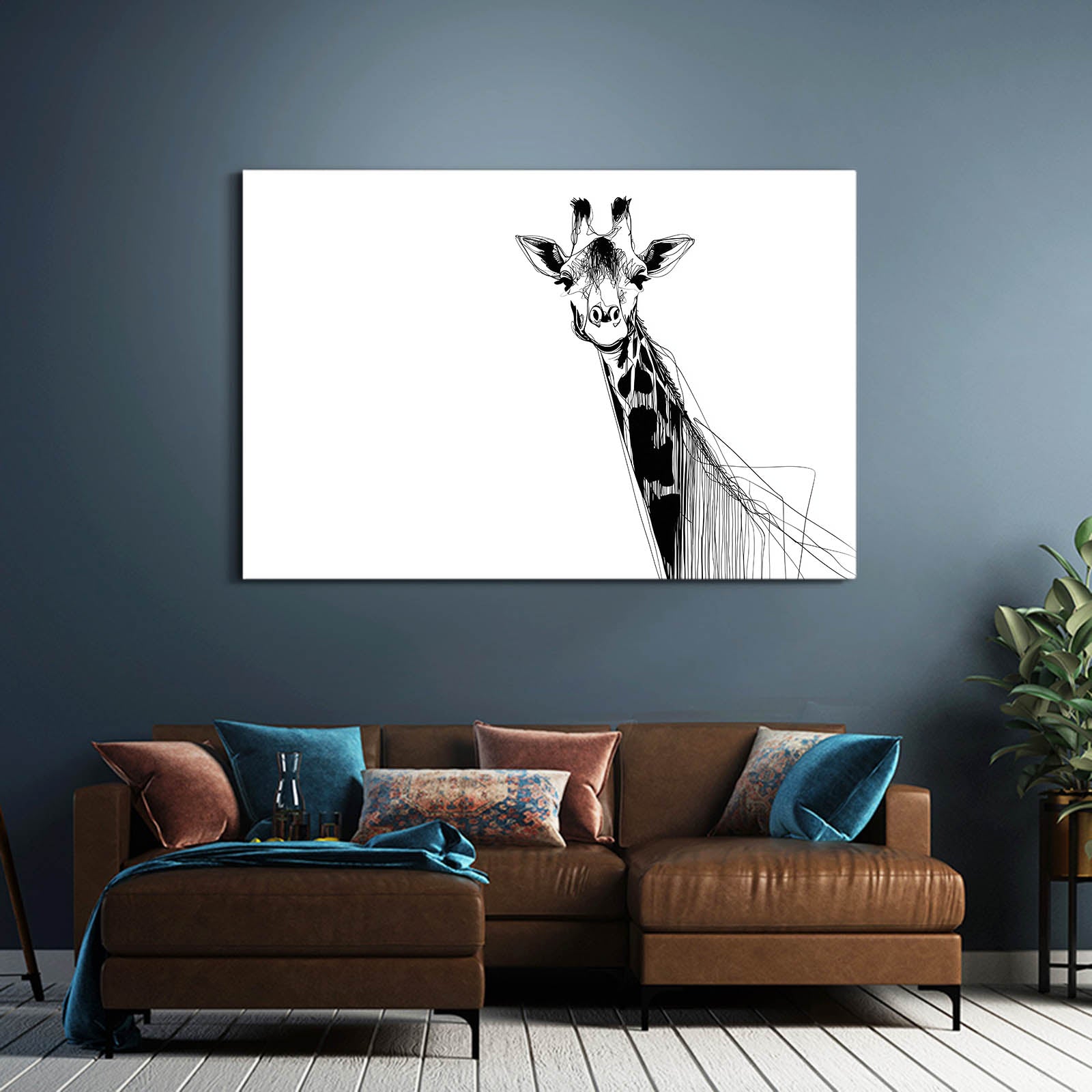 Giraffe artwork on a wall above a brown sofa with colorful cushions.