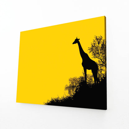 Canvas print with a black silhouette of a giraffe against a yellow background