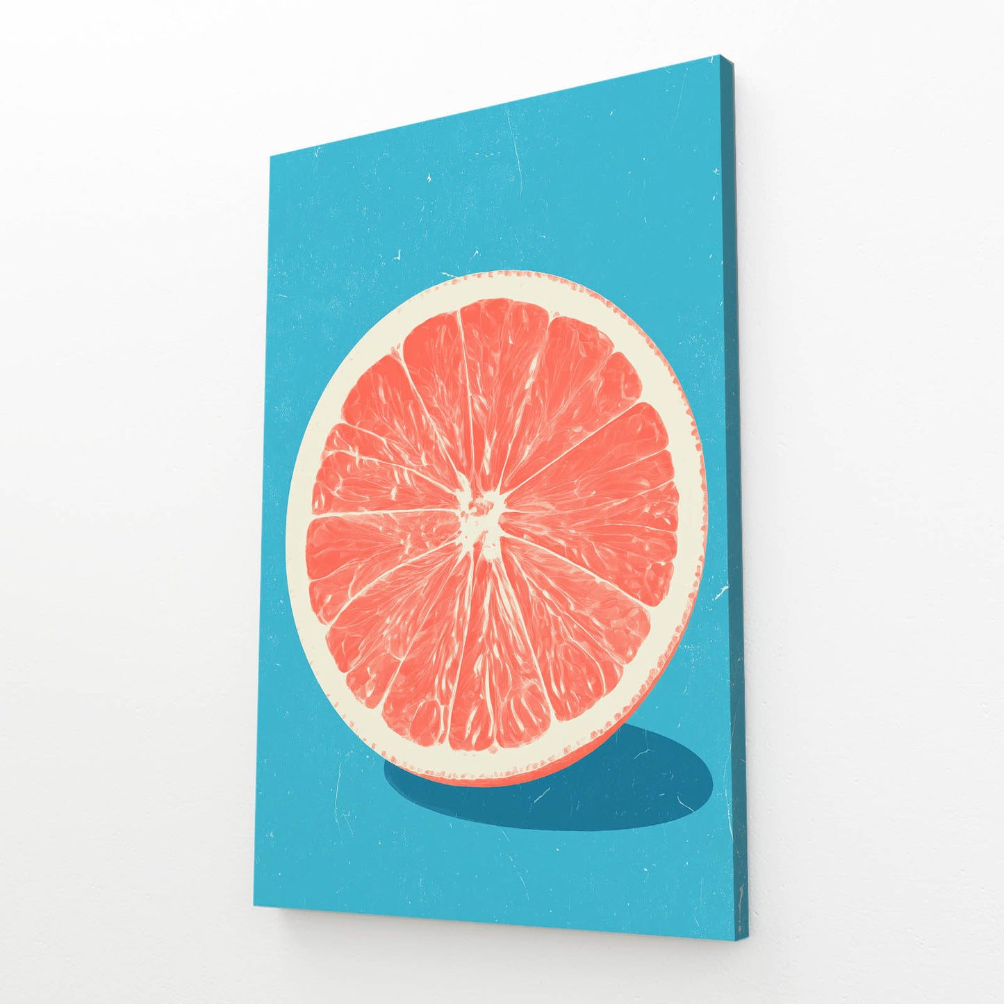 Grapefruit Slice Blue Fruit Wall Art – angled canvas view on white background