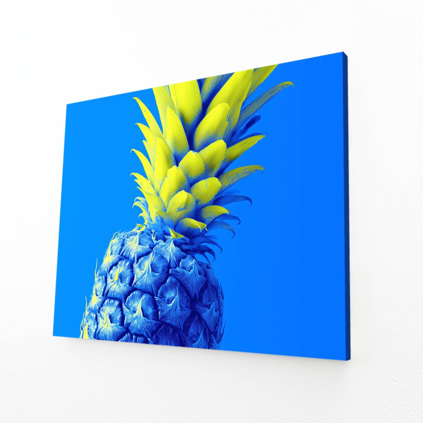 Neon Blue Pineapple Fruit Canvas Art – angled canvas view on white background