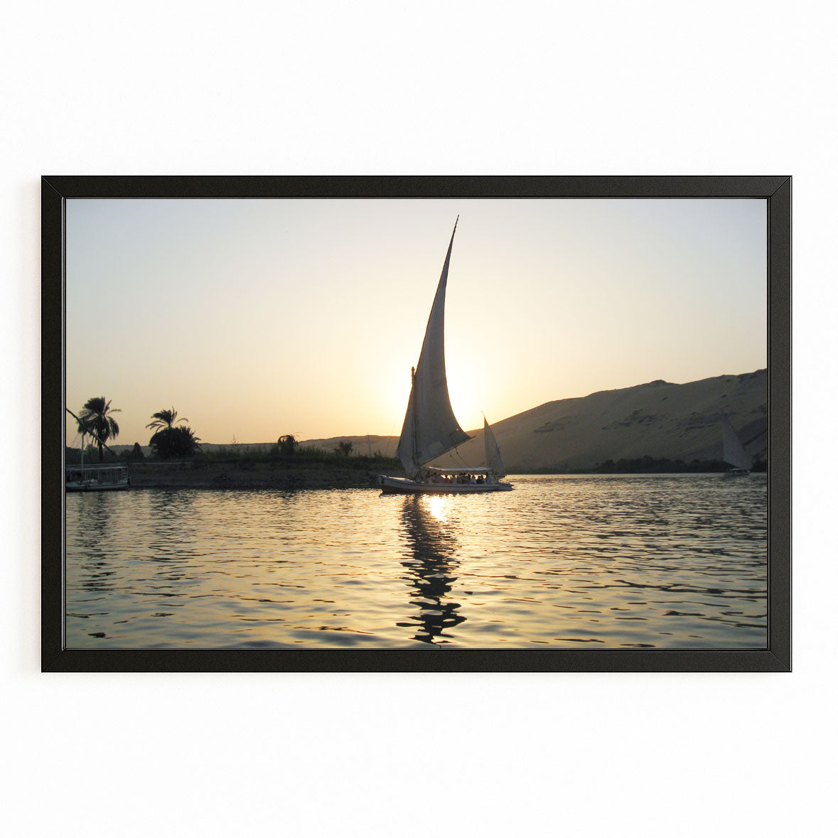 Nile Sunset Sail Egyptian Canvas – with Premium Black frame on white background