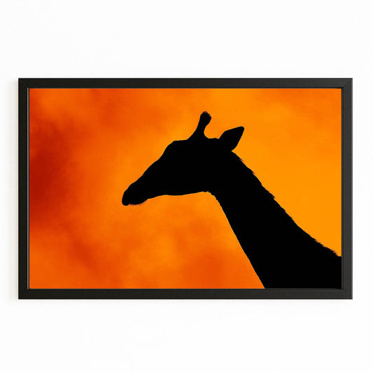 Framed artwork of a black giraffe silhouette against an orange background