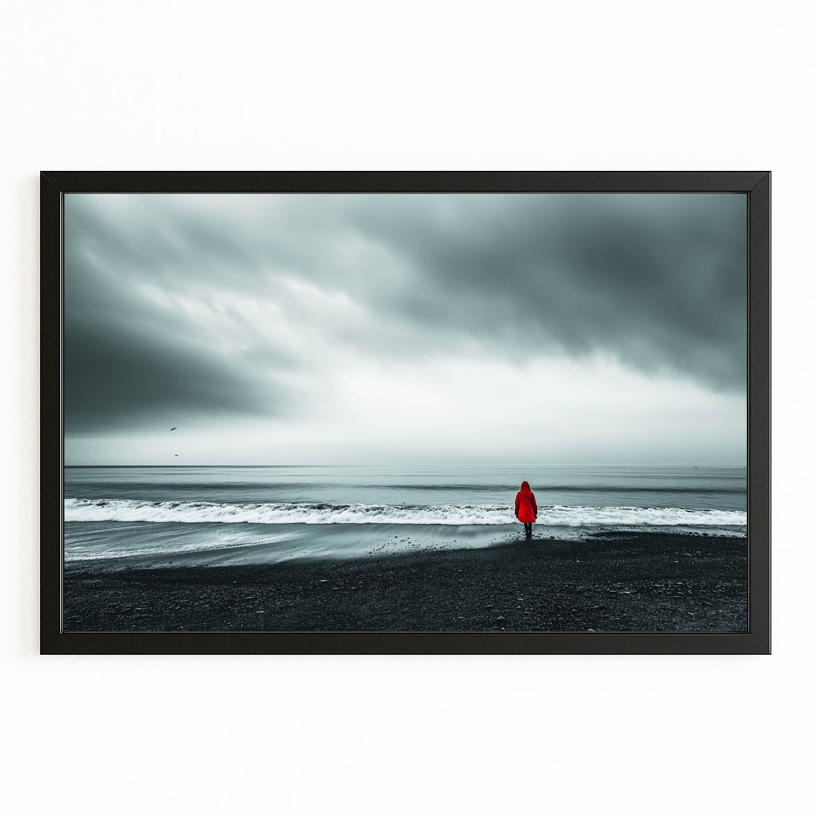 Red Coat Beach Photography Canvas — photography canvas print, with Premium Black frame on white background