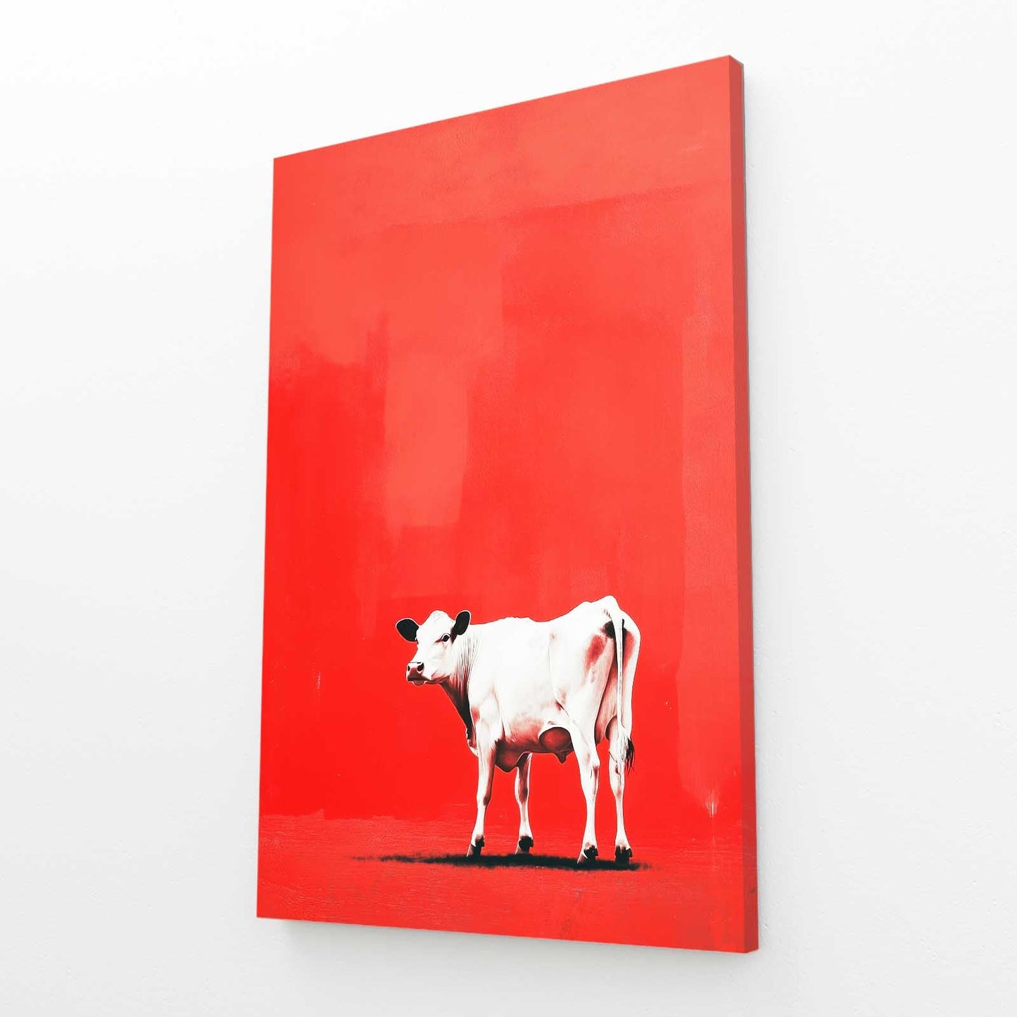 Red Cow Wall Art – angled canvas view on white background