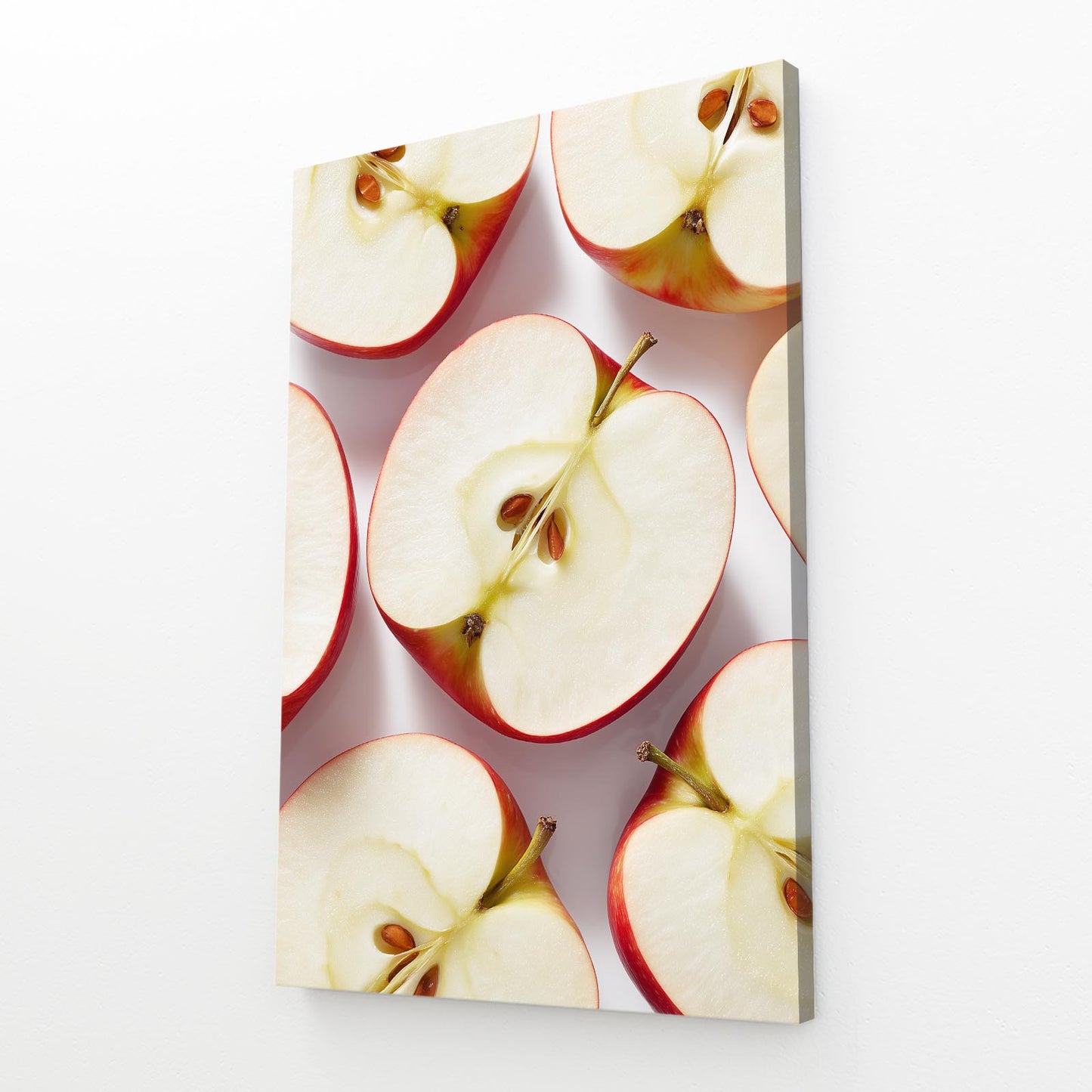 Sliced Halves Pattern Apple Wall Art – angled canvas view on white background