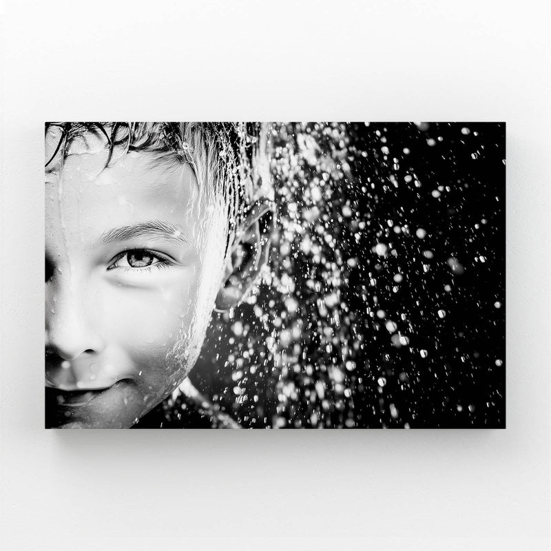 Winter Freckles Photography Canvas – boy's face peeking through swirling snowfall